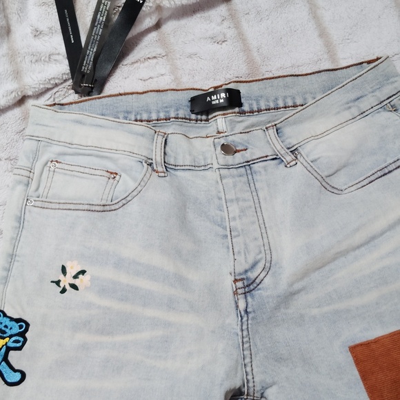 AMIRI Blue Straight Leg Jeans with Distressing and Embroidery